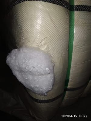 POLYESTER STAPLE FIBRE WITH A LENGTH OF 64MM AND A HOLLOW/CONJUGATE SLICK FINISH.  TENSILE STRENGTH 2.8. NOT CARDED, COMBED OR OTHERWISE PROCESSED. IN 250 KG BALES.