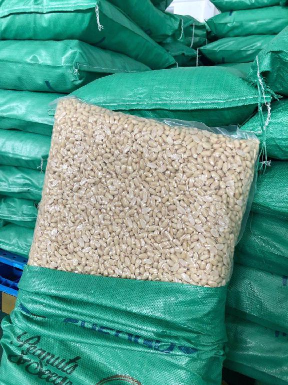 BLANCHED PEANUTS

THESE PEANUTS GO THROUGH A HEAT TREATMENT FOR BLANCHING CONSISTING OF SPRAYING WITH WATER, HEATING/STEAMING IN AN OVEN FOR BETWEEN 30-60 MINS AT 80-100 DEGREES, COOLING FOR 24 HOURS, PEANUTS SHELLED, SORTING, MAGNET AND X-RAY CHECKING AND THEN SIEVING.