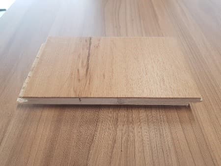 THIS PRODUCT ARE PRE-FINISHED OAK WOOD MULTI-LAYERED BOARD-LIKE PARQUET PANELS DESIGNED FOR USE AS A SITE ASSEMBLED SEMI-STRUCTURAL FLOOR COVERING.  

THE PARQUET PANELS ARE EITHER 1200/1900MM LONG X 150/190MM WIDE X 14MM THICK AND ARE IN THE FORM OF A 3-LAYER PANEL COMPOSED OF AN APPROXIMATE 2MM WITH A THICK LOWER BALANCING LAYER OF POPLAR WOOD, A 9MM THICK STRUCTURAL MIDDLE LAYER FROM POPLAR, AND A 3MM THICK OAK TOP WEAR LAYER SURFACE.  THE PRODUCT ALSO HAS A HARDWEARING LACQUER FINISH CAPABLE OF BEING SANDED BACK AND REFINISHED. 

THE 3 LAYERS ARE DESIGNED TO PROVIDE A MULTI-DIRECTIONAL STABLE BOARD STRUCTURE.  THE EDGES ARE PROFILED TO A CLICK OR TONGUE AND GROOVE SYSTEM, FOR USE AS A SEMI-STRUCTURAL PRE-FINISHED PARQUET FLOOR COVERING.  THE 'COMPOSITE FLOOR SLAB', IS MADE OF WOOD, NOT MADE OF BAMBOO, AND NOT FOR MOSAIC FLOORS.