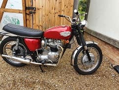 1968 TRIUMPH BONNEVILLE, 2 WHEELED MOTOR CYCLE. 

DESIGNED TO TRANSPORT 2 PERSONS. 650CC AIR-COOLED OHV (OVERHEAD VALVE) VERTICAL TWIN,  PETROL ENGINE. 4 SPEED CONSTANT MESH TRANSMISSION. THE BODY COLOUR IS RED WITH CHROME DETAILS AND A BLACK SEAT.
.
THE MODEL IS NO LONGER IN PRODUCTION.