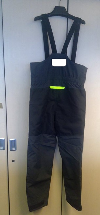 WOVEN SALOPETTE STYLE GARMENT FOR CHILDREN. MADE FROM EXPLORE(R) 2- LAYER WATERPROOF AND BREATHABLE FABRIC XPEL(R) WITH STAIN REPELLANT TECHNOLGY.
IT HAS A FRONT OPENING THAT IS FASTENED WITH A ZIP AND HAS AN INTERNAL GUSSET FOR WET WEATHER PROTECTION. 
IT HAS ADJUSTABLE BRACES AND A SEMI ELASTICATED WAIST.
IT IS GREY IN COLOUR WITH REINFORCED SEAT AND KNEES IN BLACK.
THE COMPANY LOGO IS ON BOTH THE FRONT AND BACK OF THE GARMENT. 
THE ITEM IS MADE FROM 100% NYLON MAIN LINING: 100% POLYESTER MESH: 100% POLYESTER FLEECE LINING