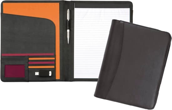 A BLACK WRITING CASE.
THIS IS A NON-ZIP NOTEBOOK CASE WHICH OPENS UP TO HOLD A A4 RECYCLED 20 PAGE NOTE PAD, IT ALSO HAS A PEN HOLDER IN THE MIDDLE OF THE CASE AND ONCE OPENED IT HAS A USB HOLDER AND CREDIT CARD COMPARTMENTS ON THE LEFT HAND SIDE OF THE CASE.
IT IS MADE FROM PADDED PU FABRIC . SIZE 24 X 35CM