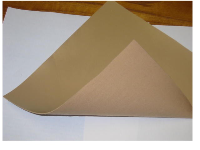 PLASTIC, IN ROLLS, POLYVINYL CHLORIDE, CELLULAR, WITH A BACKING OF 100% COTTON WHICH IS PRESENT FOR REINFORCEMENT PURPOSES, THE PLASTIC IS DYED BEIGE OR WHITE AND IS USED TO MAKE WRIST SUPPORTS.