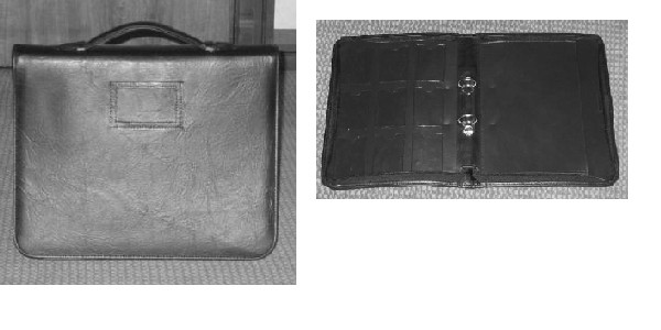 A BRIEFCASE TYPE CONTAINER WITH AN OUTER SURFACE OF WOVEN POLYESTER FABRIC, WITH A TEXTILE HANDLE ATTACHED, IT HAS A ZIP CLOSURE ON THREE SIDES, THE INSIDE OF THE CONTAINER CONSISTS OF A TWO RING BINDER MECHANISM, A LARGE INTERNAL POCKET TO HOLD PAPERS ETC. AND NINE PLASTIC POCKETS FOR BUSINESS CARDS.