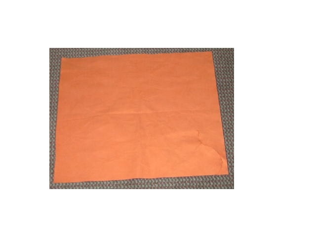 FABRIC, IN ROLLS, NON-WOVEN, MADE FROM FILAMENT, COMPOSED OF 70% POLYESTER AND 30% NYLON, IT WEIGHS 100G/M2, THE FABRIC IS DYED AND USED IN THE MANUFACTURE OF TOWELS.