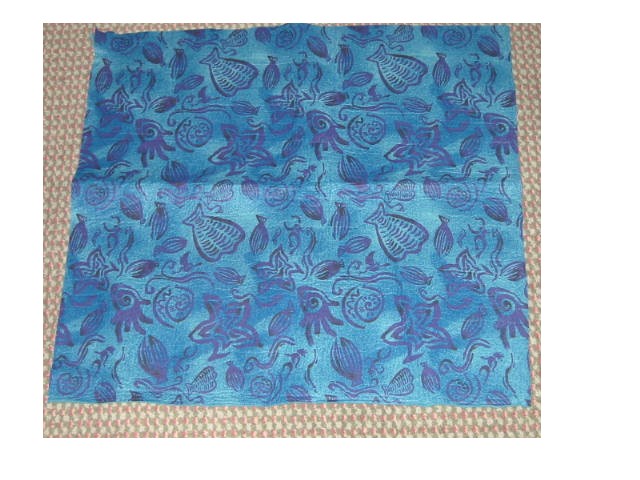 FABRIC, IN ROLLS, NON-WOVENS, MADE FROM FILAMENT, COMPOSED OF 92% VISCOSE AND 8% POLYPOPYLENE, IT WEIGHS 200G/M2, THE FABRIC IS DYED AND IS USED IN THE MANUFACTURE OF TOWELS.