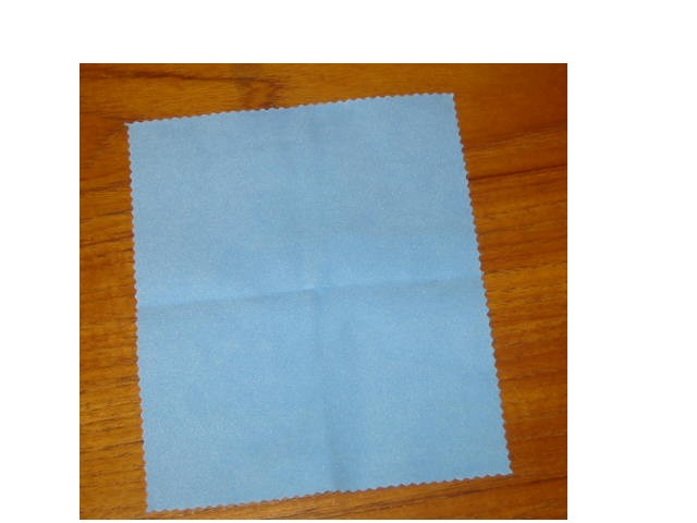 FABRIC, WOVEN, COMPOSED OF 80% POLYESTER AND 20% NYLON, OF MAN-MADE STAPLE FIBRES, CUT TO RECTANGULAR SHAPE, APPROX. 18CM X 15CM, CUT WITH SERRATED EDGES TO PREVENT UNRAVELLING, USED TO CLEAN CD'S, DVD'S, TELEVISION SCREENS AND COMPUTER MONITORS.