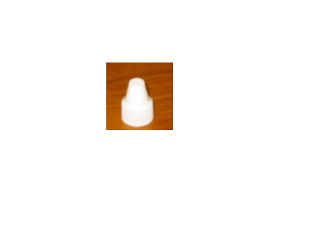 A SCREWCAP OF PLASTIC.