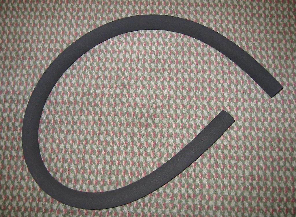 FOAM TUBE COMPOSED OF NEOPRENE RUBBER USED AS PART OF A PLASTIC PLATY BOTTLE TO INSULATE THE DRINKING TUBE.