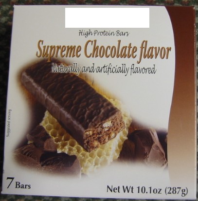 CHOCOLATE AND OTHER FOOD PREPARATIONS CONTAINING COCOA; IN BLOCKS, SLABS OR BARS; FILLED; HIGH PROTEIN BAR IN CHOCOLATE-FLAVOURED COATING; PUT UP IN PACKS OF 7 BARS.