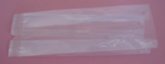 NON CELLULAR POLYPROPYLENE MATERIAL WHICH IS BIAXIALLY ORIENTED; PRESENTED ON ROLLS MEASURING 254 MM IN WIDTH AND 381 MM IN DIAMETER AND 0.065 MM IN THICKNESS.
