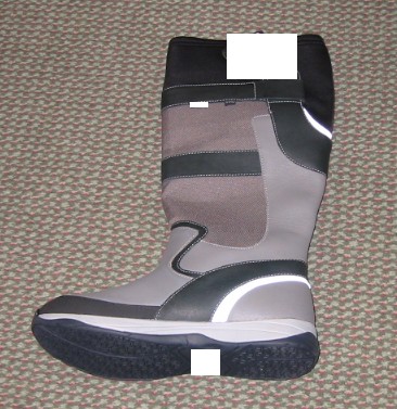 FOOTWEAR, KNEE HIGH SAILING BOOTS, WITH OUTER SOLES OF RUBBER, WITH INSOLES OF A LENGTH OF 24CM OR MORE AND UPPERS OF WATERPROOF LEATHER AND TEXTILE, THE LEATHER PREDOMINATES, LINED WITH GORE-TEX, WITH AN ELASTICATED TEXTILE TOP SECTION WHICH FITS SNUGLY AROUND THE CALF TO HELP PREVENT WATER COMING IN, WITH A MULTI-LAYER MOULDED SOLE, WITH A LIGHTWEIGHT EVA (ETHYL VINYL ACETATE) MIDSOLE FOR COMFORT AND SHOCK ABSORBENCY, OF LOW DENSITY POLYMERS (0.2G/CM3), HAVING A CIF PRICE PER PAIR OF NOT LESS THAN 7.5 EUROS, FOOTWEAR INVOLVING SPECIAL TECHNOLOGY.