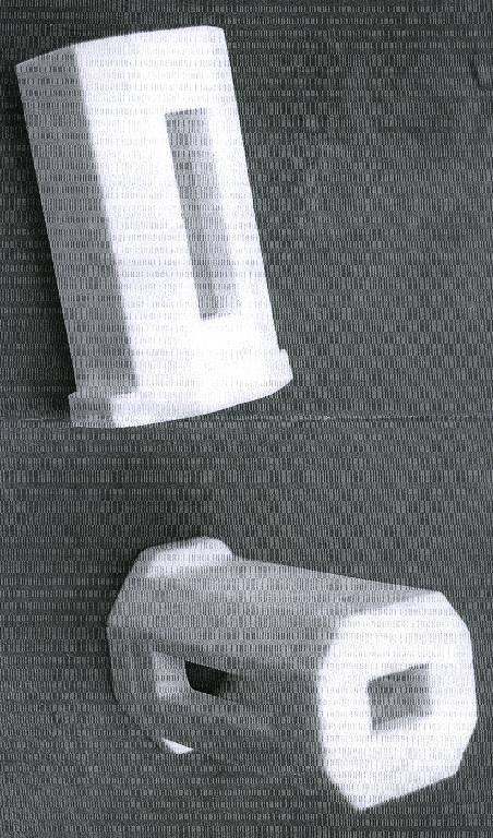 PORCELAIN END TERMINAL. THIS HOLDS A GLASS HEATING ELEMENT IN PLACE AND IS SPECIFIC TO AN ELECTRIC HEATER.