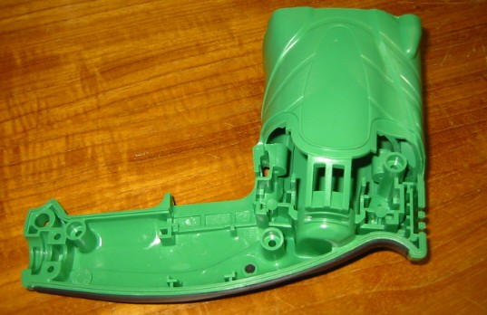 PLASTIC HOUSING USED IN THE MANUFACTURE OF A HAND HELD POWER TOOL DRILL
