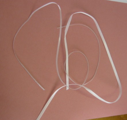 DATA CABLE ISOLATOR TAPE. THE TAPE WHICH IS FLAT IS USED TO WRAP AROUND THE INDIVIDUAL LENGTHS OF ELECTRICAL WIRE BEFORE IT IS ENCASED IN THE OUTER PLASTIC COVER. IT IS NON CELLULAR POLYPROPYLENE PLASTIC AND IS LAMINATED WITH PVC. IT IS MORE THAN 0,10MM IN THICKNESS AND IS BIAXIALLY ORIENTED FOR INSULATION PURPOSES.