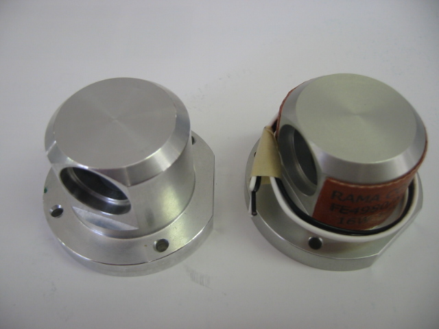 A HEATING ELEMENT - THIS IS A CUSTOM BUILT HEATING ELEMENT BONDED TO AN ALUMINIUM MACHINED PART. THIS PART IS USED EXCLUSIVELY IN THE ASSEMBLY OF A MECHANICAL VENTILATOR OR THERAPEUTIC RESPIRATION APPARATUS.