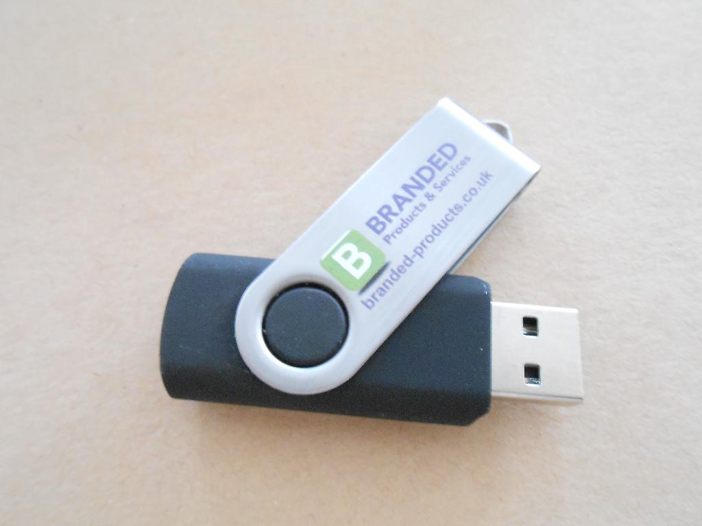 TWISTER USB MEMORY STICK THAT FOLDS, TWIST PART IS MADE FROM METAL - CONTAINS A CHIP