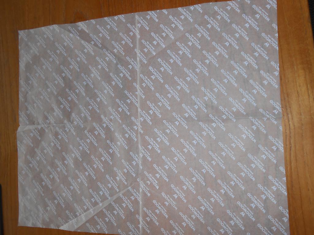 PRINTED WHITE TISSUE PAPER.