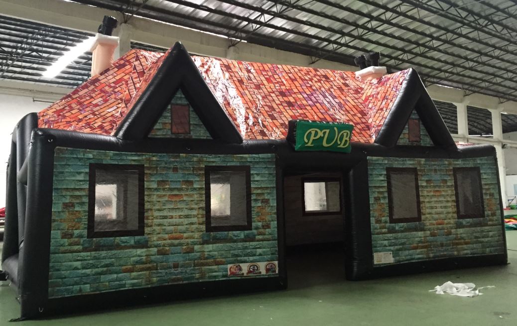 INFLATABLE  PUB. 
IT’S AN INFLATABLE TENT LIKE STRUCTURE COMPOSED OF A SYNTHETIC TEXTILE COATED WITH PVC (POLYVINYL CHLORIDE). IT IS USUALLY ACCOMPANIED BY A BLOWER TO INFLATE. IT IS USUALLY WRAPPED IN A TARPAULIN WHICH IS USED TO PROTECT THE TENT AND ALSO ENABLE IT TO BE MOVED.