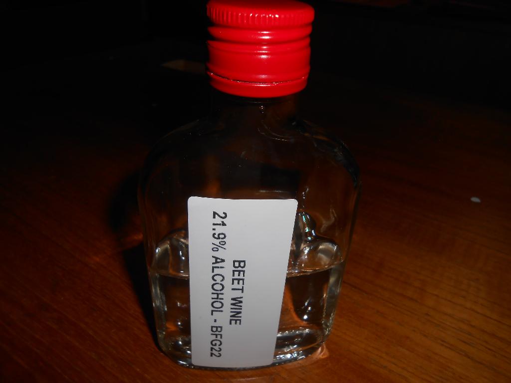 PRODUCT - SUGAR BEET WINE - ABV 22.3%
WCD REFERENCE - BFG22.

DECLARED MANUFACTURE PROCESS - A SUGAR BEET EXTRACT IS PREPARED BY MIXING SUGAR BEET EXTRACT 80% BRIX/1.4250 G/L AND WATER AT 41% AND 59% RESPECTIVELY.  THE SOLUTION IS HEATED TO 22'C THROUGH A TUBULAR HEAT EXCHANGER AND INCOLUCATED WITH YEAST AT AN INCLUSION LEVEL OF 0.4%, W/W.  THE MIXTURE IS ALLOWED TO FERMENT BETWEEN 18-22'C OVER 5 DAYS UNTIL THE FERMENTATION IS COMPLETE AND ALL THE SUGARS HAVE BEEN METABOLISED.  THE END PH, SG, % ALCOHOL AND RESIDUAL SUGAR CONTENT OF THE PRODUCT IS PH 4.0-4.5, 0.9683G/L, 21.9% ALCOHOL AND <1.0% RESPECTIVELY.  THE YEAST IS SEDIMENTS THROUGH A COMBINATION OF KIESELGUHR AND ISINGLASS AND CENTRIFUGED AT CIRCA 4,000G