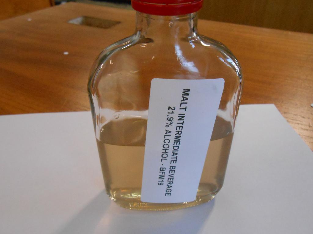 PRODUCT - MALT BEVERAGE - ABV 18.6%. 
WCD REFERENCE - BFM19 

DECLARED MANUFACTURE PROCESS - MALTED BARLEY FLOUR, HOPS AND WATER MIXED AT 32%, 0.25% AND 57.75% RESPECTIVELY.  THE MIXTURE IS HEATED TO 65'C AND ALLOWED TO MIX FOR 2 HR.  THE SPENT GRAIN IS REMOVED BY LAUTERING.  THE MIXTURE IS INOCULATED WITH YEAST AND ALLOWED TO FERMENT BETWEEN 18-22'C OVER 5 DAYS UNTIL THE FERMENTATION IS COMPLETE AND ALL THE SUGARS HAVE BEEN METABOLISED.  THE END PH, SG, % ALCOHOL AND RESIDUAL SUGAR CONTENT OF THE PRODUCT IS PH 4.0-4.5, 0.9683G/L, 21.9% ALCOHOL AND <1.0% RESPECTIVELY