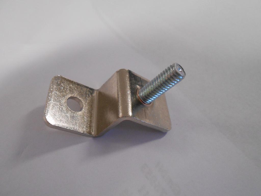 FIXING BRACKET.
THE PRODUCT IS USED TO HOLD THE FUSE AND FORMS PART OF THE CIRCUIT. IT IS AN ELECTRICAL CONDUCTOR AND CAN TAKE HIGH TEMPERATURES.  IT IS USED IN THE 6KW BELATRON CHARGING UNIT
IT IS MADE OF A COPPER ALLOY PLATED IN NICKEL