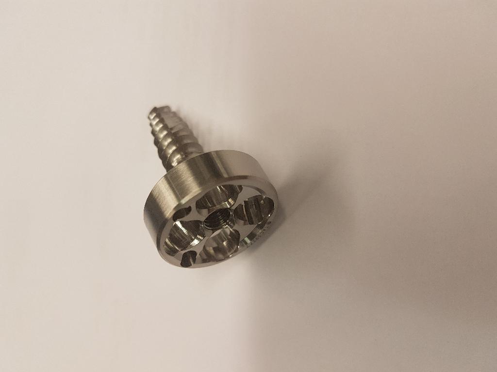 TITANIUM ORTHOPAEDIC SHOULDER PLATINE, IMPLANTED TO COMPENSATE FOR DEFECT/DISABILITY.