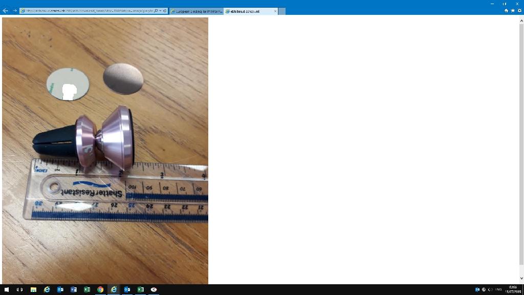 ALUMINIUM PHONE MOUNT.
THIS IS USED TO ATTACH A MOBILE DEVICE TO A CAR VENT.
THE DEVICE CONTAINS 6 NEODYMIUM IRON BORON EMBEDDED MAGNETS AT ONE END.  THE DEVICE CAN ADJUST TO DIFFERENT MOUNTING ANGLES.  THERE ARE 2 MAGNETIC MOUNTING DISKS INCLUDED.  THERE IS AN ADHESIVE LAYER ON ONE SIDE OF THE DISK WHICH IS USED TO ATTACH THE DISKS TO A MOBILE DEVICE.  THE PHONE MOUNT WILL USE THE MAGNET TO CONNECT TO THE DISKS ON THE MOBILE DEVICE.