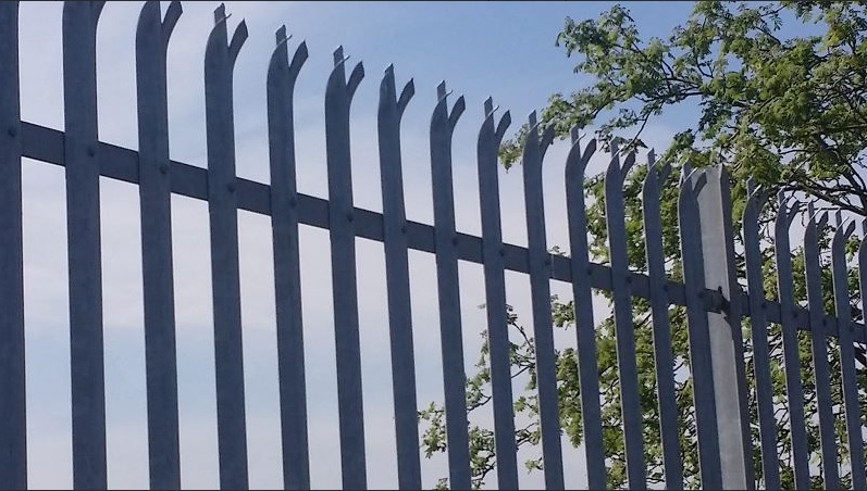 STEEL PALISADE SECURITY FENCE SYSTEMS.

IT IS MADE OF ROLLED STEEL PALES, ANGLED TOP AND BOTTOM CONNECTING RAILS, ROLLED STEEL JOISTS POSTS, GATES AND BRACKETS. IT CAN BE ZINC COATED WITH A COLOUR TOP COAT IF REQUIRED.