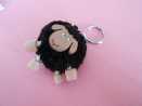 ZINC ALLOY KEYRING WITH A TOY ATTACHMENT IN THE FORM OF A SHEEP.