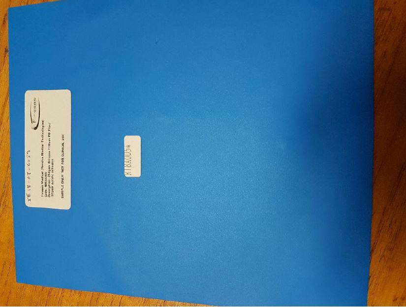 SELF-ADHESIVE FILM OF PLASTIC. THE FILM COMPRISES A POLYURETHANE LAYER COATED ON ONE SIDE WITH A COLORLESS SOFT SILICONE ADHESIVE GEL & A BLUE POLYETHYLENE LINE AND ON THE OTHER SIDE WITH AN ACRYLIC ADHESIVE & A BLEACHED
SILICONIZED PAPER.
THE ROLL WIDTH AT THE POINT OF IMPORT IS 23CM. THE SELF ADHESIVE FILM IS USED IN THE MANUFACTURE OF FINISHED
SELF-ADHESIVE WOUND DRESSING PUT UP FOR RETAIL SALE
Used as Self Adhesive Wound Dressing
The product comprises of Silicone 250 gsm / Polyurethane Film 100um / Acrylic Adhesive 37 gsm
The product is a Blue Adhesive film of plastic.