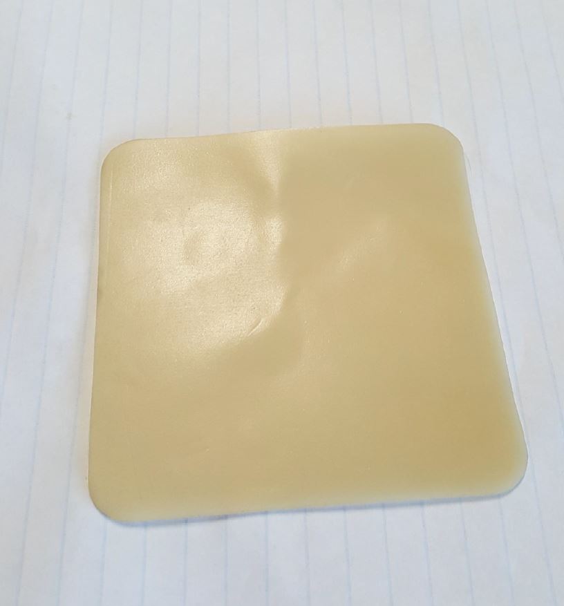 SELF-ADHESIVE HYDROCOLLOID GUM LAMINATED ON ONE SIDE WITH A POLYURETHANE FILM AND ON THE OTHER WITH A PROTECTIVE
PAPER LINER. 
 IT IS IMPORTED IN ROLLS OF A WIDTH EXCEEDING 20 CM AND 100 METERS IN LENGTH.
IT IS USED IN THE MANUFACTURE OF
AN OSTOMY ACCESSORY, NAMELY, A FLANGE EXTENDER
