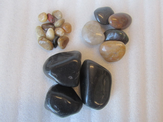 Polished Cobbles (Mineral,rock, pebble).  River cobbles that are tumbled, polished and waxed, irregular shapes.
Landscaping and grave decoration
PRESENTED IN 25KG UNITS