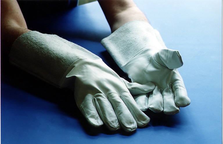Welding Gauntlet - a protective work glove (gauntlet) ofwhich extends in length past the wrist. The glove has a .
It is designed to protect the hand and is worn while welding. It is available in a variety of colours.
Leather with woven lining