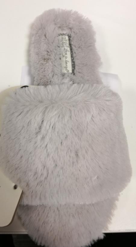LADIES FUR MULE STYLE SLIPPER WITH OPEN TOE, UPPERS OF TEXTILE, OUTER SOLES OF PLASTIC COVERED WITH TEXTILE. THE TEXTILE IS CONSIDERED TO BE THE SURFACE IN GREATEST CONTACT WITH THE GROUND