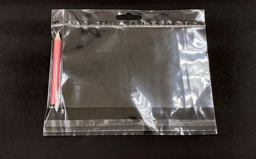PENCIL MADE FROM WOOD (100% POPLAR) AND LEAD (GRAPHITE 70%; CLAY 25%; TALLOW 5%) IN A TRANSPARENT OPP (ORIENTED POLYPROPYLENE) BAG.