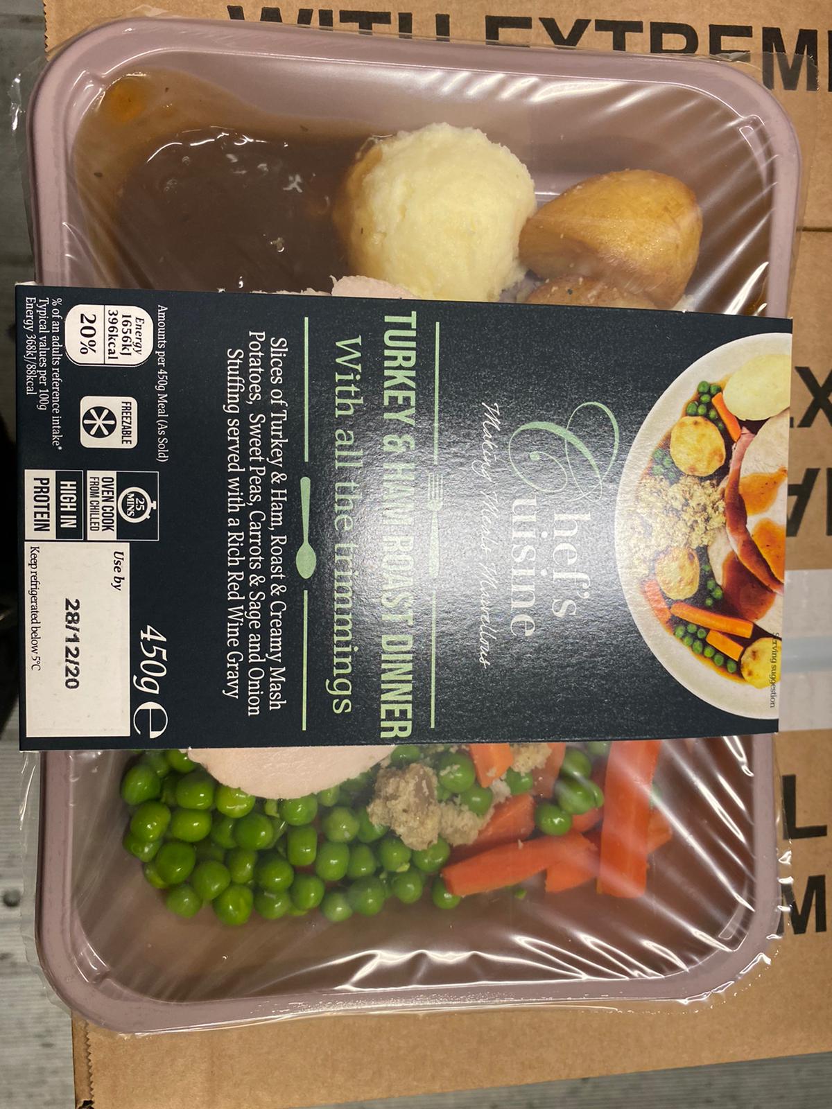 TURKEY & HAM ROAST DINNER.

TURKEY & HAM ROAST DINNER WITH ALL THE TRIMMINGS CONSISTING OF SLICES OF TURKEY & HAND, ROAST & CREAMY MASH POTATOES, SWEET PEAS, CARROTS & SAGE AND ONION STUFFING SERVED WITH A RICH RED WINE GRAVY.
THE PRODUCT IS A CHILLED READY-MADE MEAL FOR CONSUMPTION BY THE CUSTOMER.
IT IS IN A RECTANGULAR PLASTIC TRAY, WITH A FILM COVERING AND A CARDBOARD SLEEVE AROUND IT AND WEIGHS 450 GRAMS.