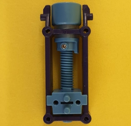 TILT MECHANISM.

THE TILT MECHANISM CONVERTS THE ROTATIONAL OUTPUT OF THE REMOTE ELECTRICAL TILT (RET) MOTOR INTO LINEAR MOVEMENT. IT ACHIEVES THIS CONVERSION VIA A SCREW AND DRIVE BLOCK. THE MOTOR (NOT THE SUBJECT OF THIS BTI) TURNS THE SCREW CLOCKWISE OR ANTICLOCKWISE AND THIS IN TURN MOVES THE DRIVE BLOCK WHICH ADJUSTS AN ACTUATOR ARM (NOT THE SUBJECT OF THIS BTI) IN AN ANTENNA.
IT IS MADE FROM POLYOXYMETHYLENE (POM).