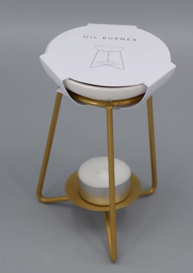 Fragrant oil burner made of ceramic and metal material.
The top/plate is made of porcelain and the frame holder is made of iron. The cost of the iron material is higher than the porcelain. There is a tealight candle included in the same package.