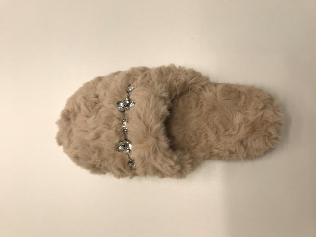A MULE STYLE SLIPPER WITH A CLOSED IN TOE; UPPERS OF TEXTILE WITH DIAMANTE TRIM, OUTER SOLES OF PLASTIC COVERED WITH TEXTILE .