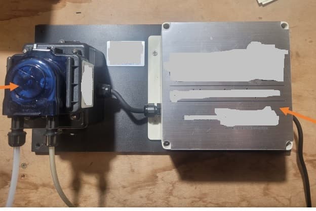 An automated wall mounted unit. The unit utilises a CPU and pump to disperse precise amounts of pre-programmed mineral liquid supplements into a water system. The pre-programmed scheduled dosage is communicated to the wall mounted unit via App on a smartphone. There is no water meter, the unit follows water consumption pattern pre-programmed on APP.