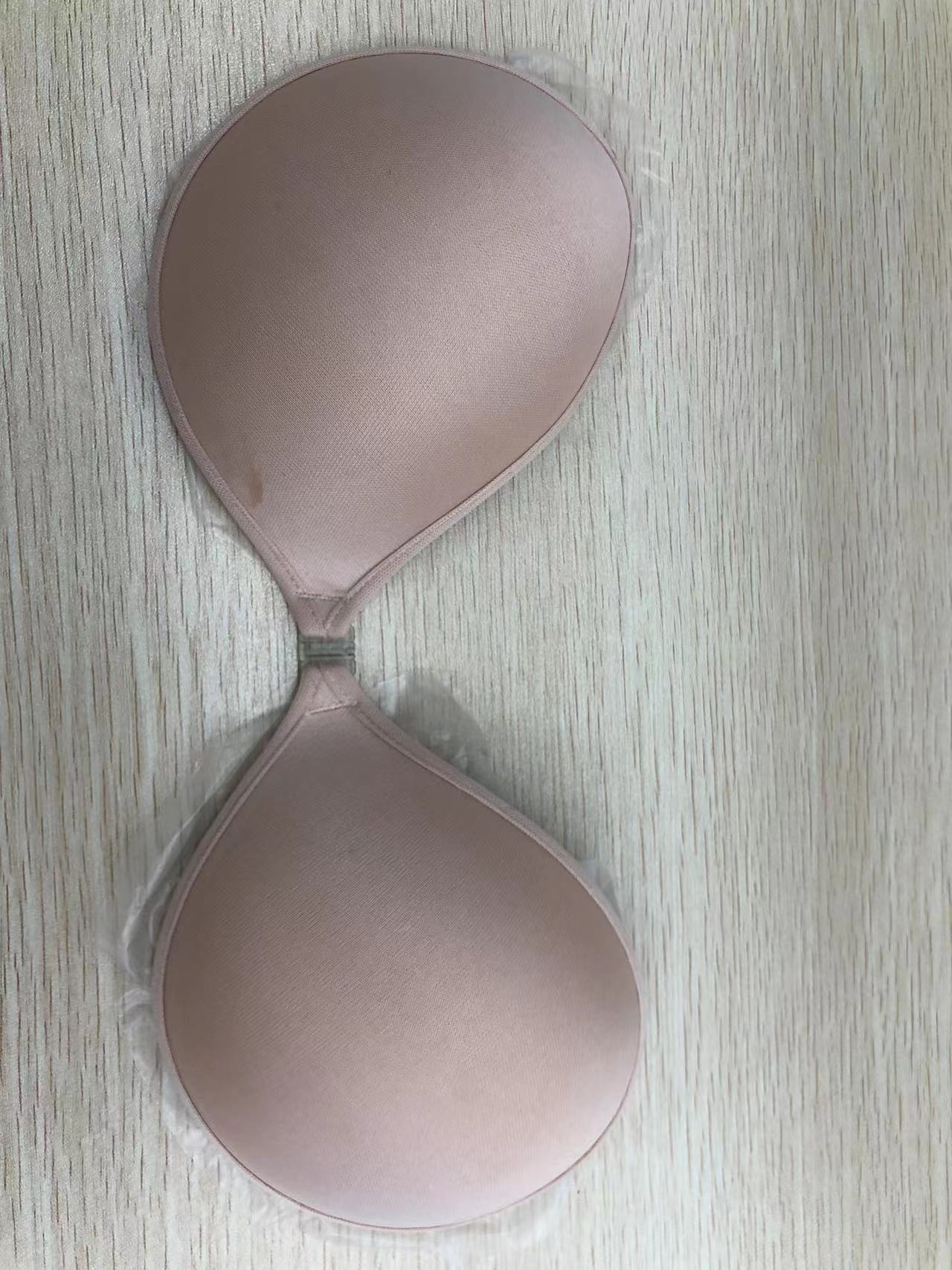 Adhesive Bra consists of two moulded cups with a plastic clip that joins the cup together at the centre. The outer layer is made of 100% polyester knitted fabric , the inner layer consists of foam pad covered with adhesive.  The adhesive bra is to support the weight and structure of the body.