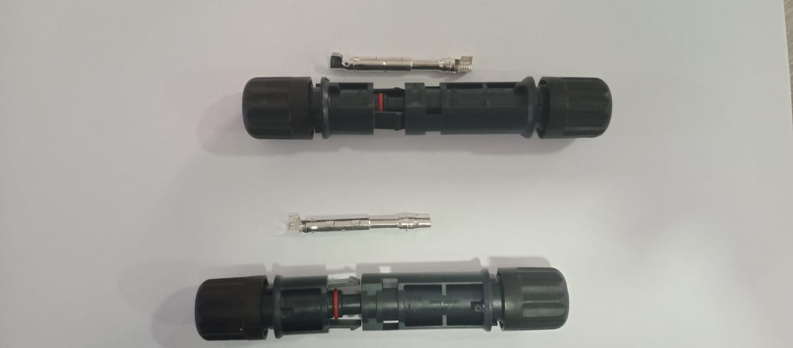 Cable Connector. 

Is it used to create an electrical connection by crimping cables or wires in a solar panel system for a voltage less than 1000v.
It has a cylindrical housing made of plastic and contains copper connector and contact elements.
