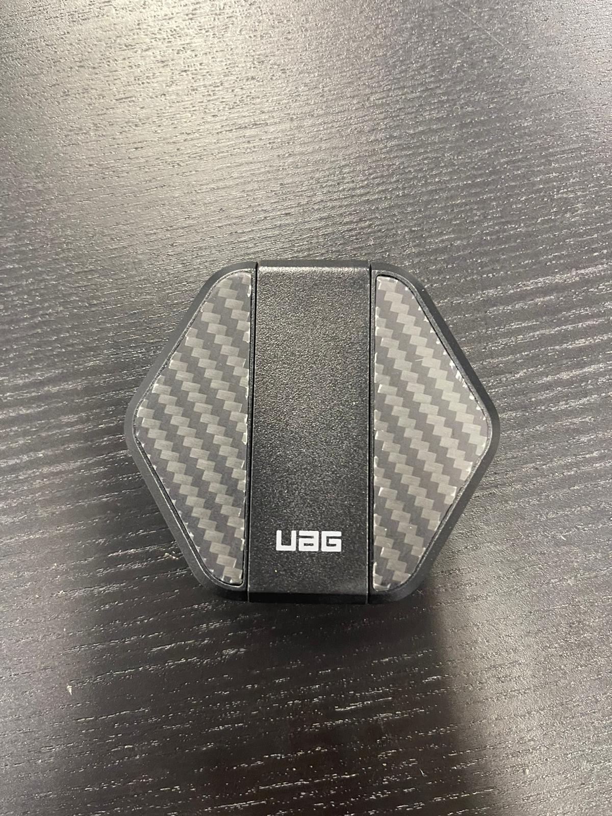 Wireless phone charger with foldable kickstand.  It is designed for wireless charging of mobile phones compatible with Magsafe technology.  The kickstand allows the user to use the phone while it is not being held in the hand.  Comes with detachable braided cable, 1.2M in length with USB C connectors.    Input: 5V/2A/- 9V/2.22A Wireless Output: 5W/7.5W/10W/15W.  Dimensions: 6cm x 6cm x 1.3cm.