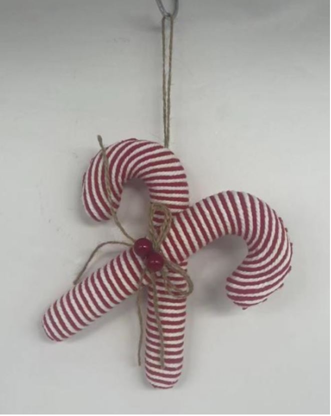Candy cane shaped Christmas tree decoration. Made of white polyfoam, wrapped with red and white fabric string. The decoration contains a loop and is designed to be hung on a Christmas tree.