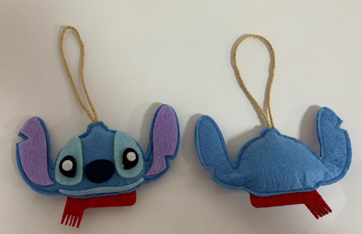 Christmas tree decoration of a well known animation character. Made of felt fabric. The decoration contains a loop and is designed to be hung on a Christmas tree.