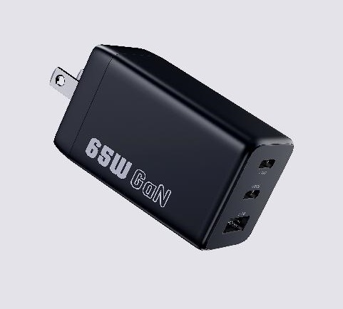 USB Charger. 

It is a 65W fast charger which includes 3 charging ports – 2x Type C & 1x Type A. It has an input voltage range of AC 100V-240V and an output voltage range of DC 5V-20V. It uses Gallium Nitride for efficient, low heat, fast charging.

It measures 44.40 x 31.40 x 59.60 mm.