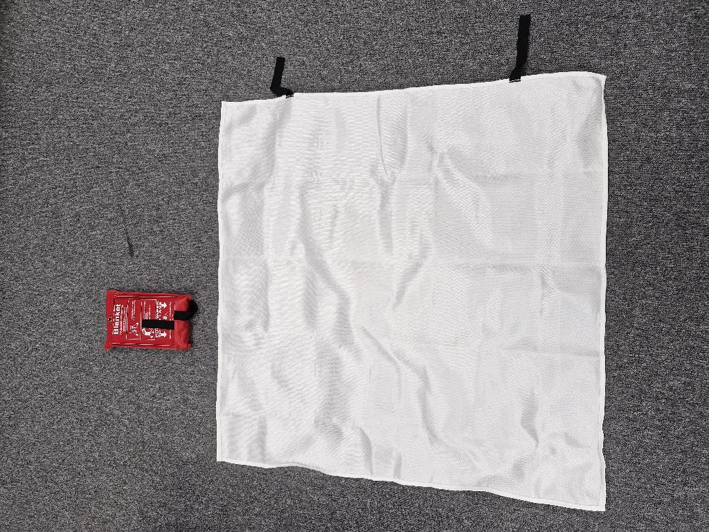 Fire blanket 1mtr Manufactured 100% glass fabric, It is used for safety in the home and workplace . How the product works /functions This Fire blanket is used to extinguish flame or fire. How it is presented /packaged dimensions (fully extended)1.0mX25mm dimensions (packed )280X160X30mm .Blanket weight 538g. Blanket + holding pouch weight 582g. The fibres of these blankets have been impregnated with fire retardant silicone rubber coating in order to comply with BS EN -1869..2019
Impregnated 
complies with  BS EN -1869..2019