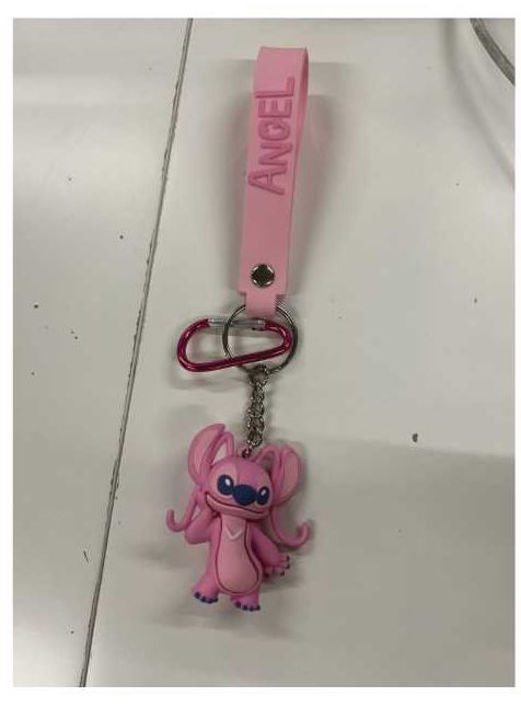 Bag charm has O shaped iron ring to hold the charms. Charms are made of moulded PVC plastic. The carabiner of aluminium alloy is to attach with the bag. 

It is designed to be a bag charm and can also be used as a key ring.
Carabiner of aluminium alloy
plastic charm
iron ring
