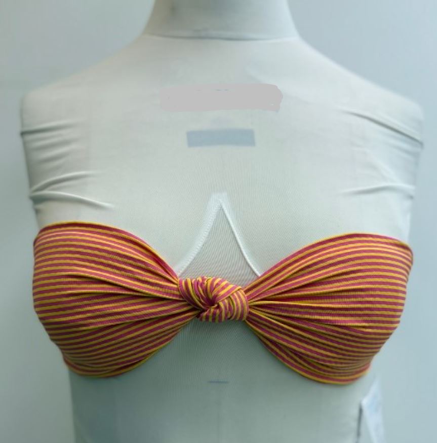 A women's bandeau bikini top made of synthetic fabric; It consists of two fabric lined cups separated by a knot.  It is closed with plastic clip at the back. Brassières